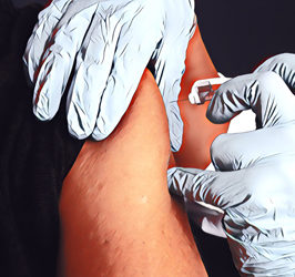 Federal courts reach divergent outcomes in health care worker vaccine disputes while class action challenges federal mandate
