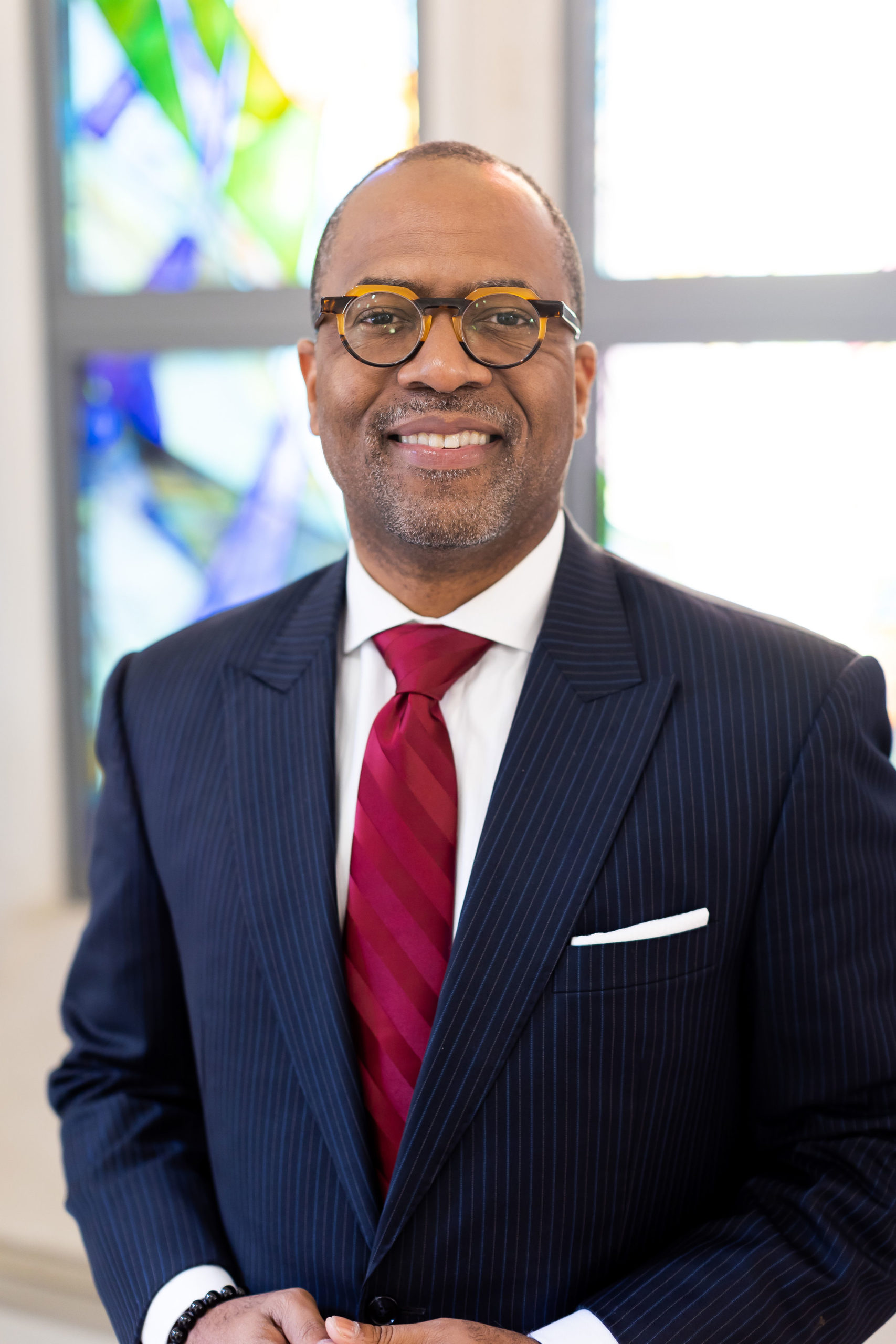 Dr. Jonathan C. Augustine (Nov. '21 headshot) 2015 RLC Luncheon with Marvin McMickle at the podium in Dallas, Texas