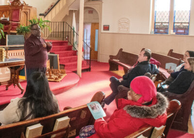 The Rev. Dr. George C.W. Lyons Jr., pastor of Gillfield Baptist Church in Petersburg, Va., speaks to participants in the Religious Freedom Immersion Experience about Black clergy who engaged in collective resistance and advocacy. He included the story of the Rev. Wyatt Tee Walker, who pastored the church from 1953 to 1960 and served as the president of the local chapter of the NAACP. The Rev. Walker then became the first full-time executive director of the Southern Christian Leadership Conference and helped organize major protests for civil rights.